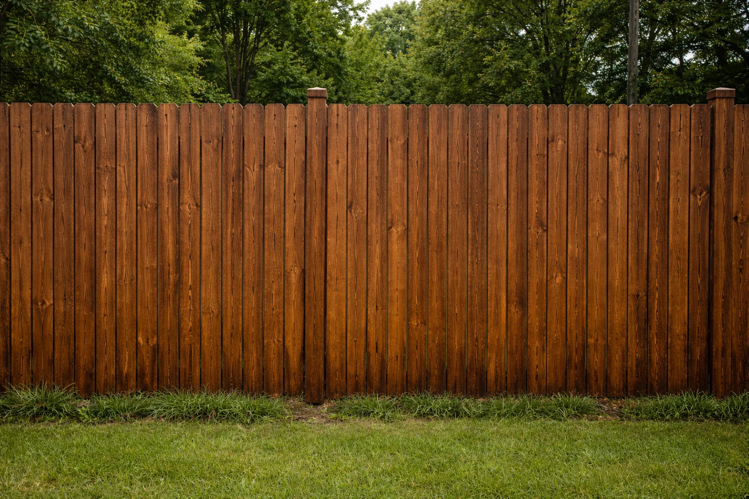Mira Lagos cedar fence with autumn brown stain finish